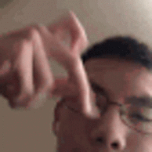 Asain throwing up em gang signs