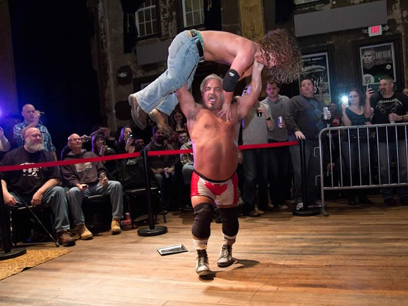 Midget wrestlers body press