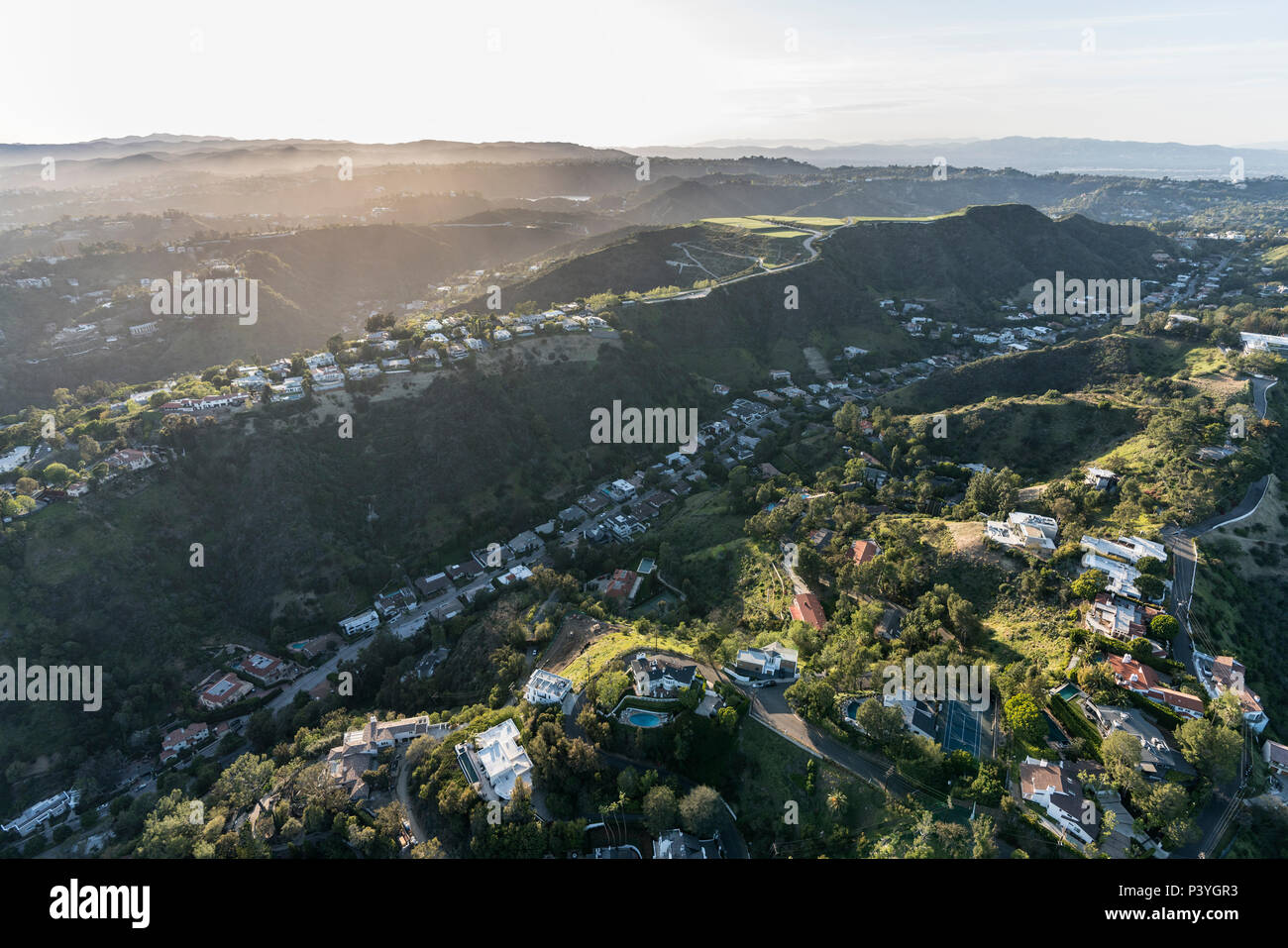 Aerial view of south beverly park canyon and hilltop homes in the santa monica mountains above