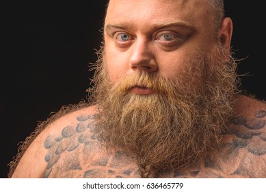 Serious fat man tattoo on 260nw 636465779