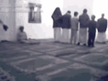 Funny muslim prayer fall over