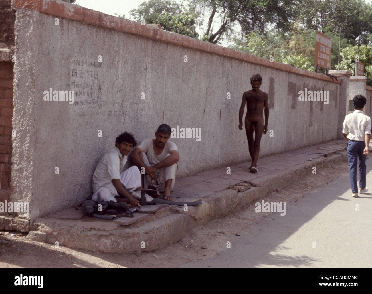 Naked man walking on pavement in india AHGMMC