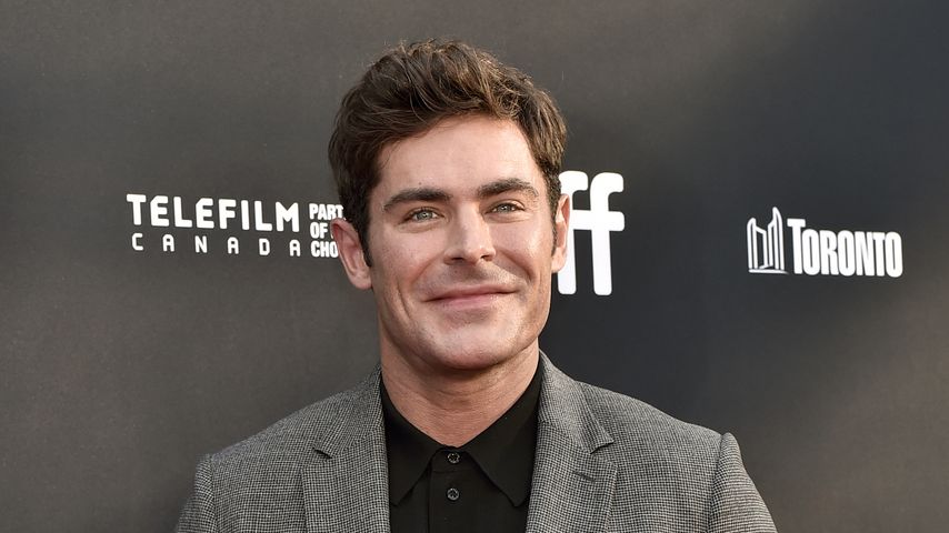 Zac efron laechelt 13