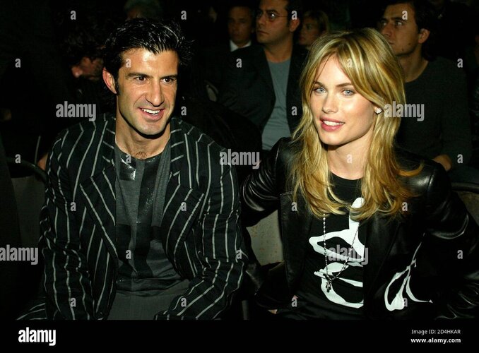 portugals-real-madrid-soccer-star-luis-figo-smiles-with-wife-helene-svedin-during-the-emporio-...jpg