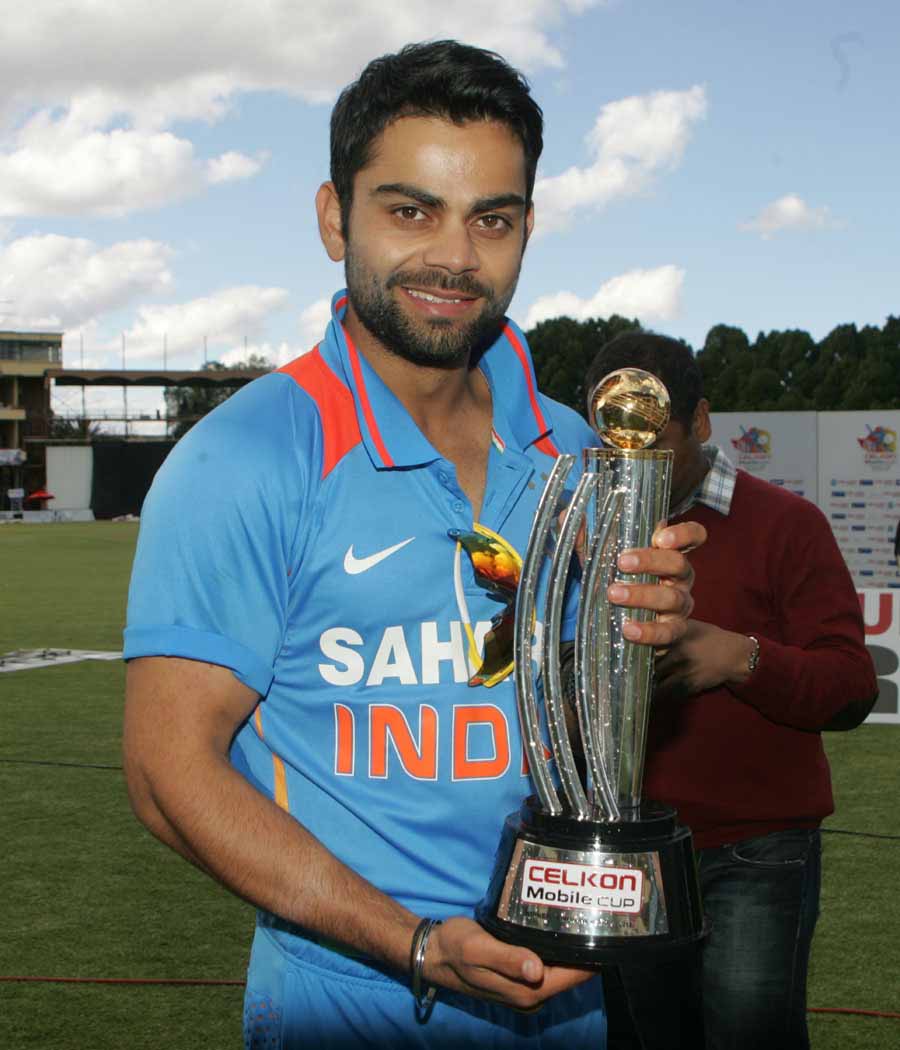 300 3004864 virat kohli with cup wallpaper virat kohli with