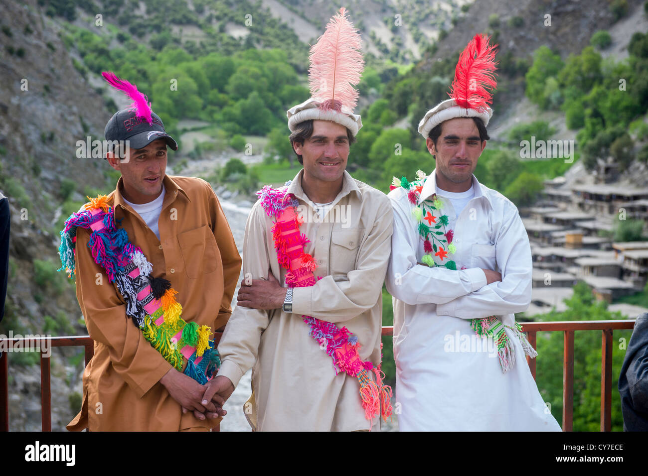 Kalash men with characteristic feather in their caps at the joshi CY7ECE