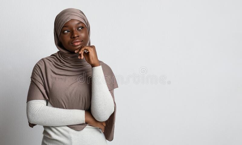 Let me think pensive black woman hijab looking copy space muslim interest african islamic lady