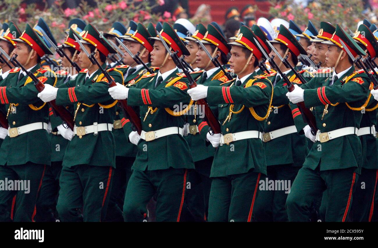 Vietnamese soldiers march during a military parade at ba dinh square in hanoi october 10 2010 