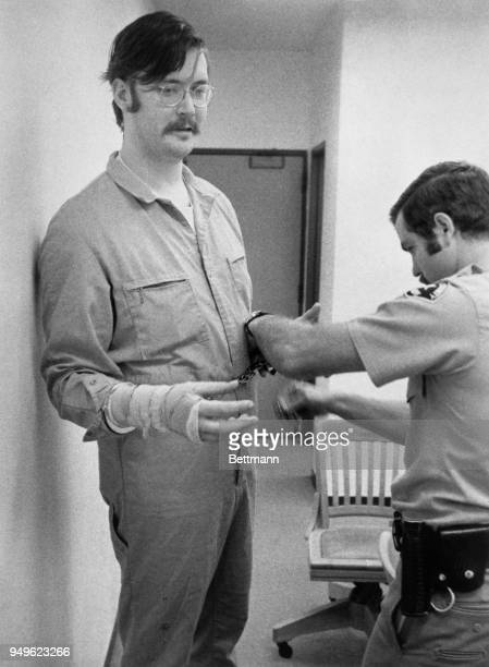 Edmund kemper iii is manacled by santa cruz sheriff deputy ron atkinson following the 5th day