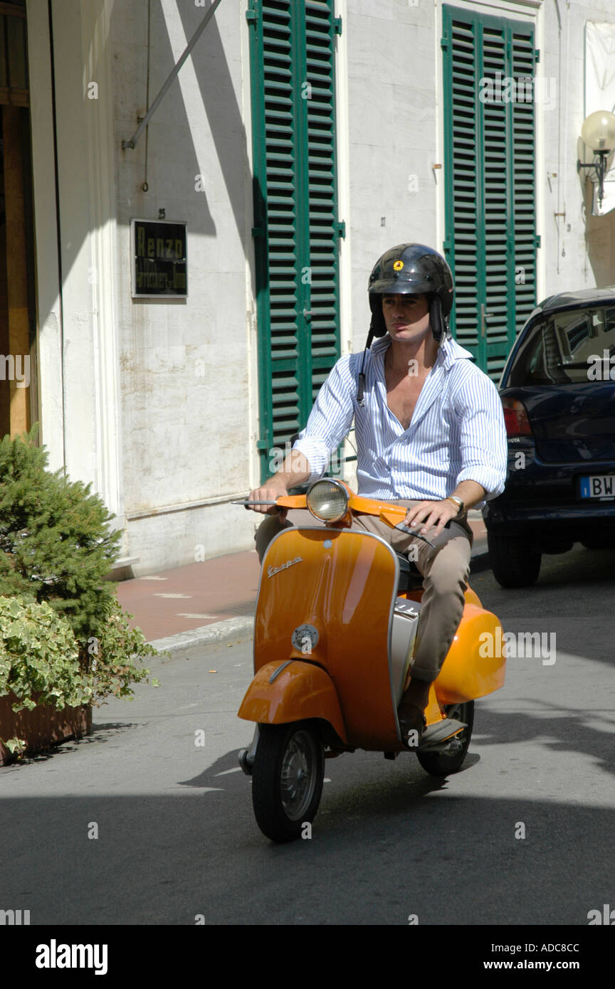 Italian man riding a scooter ADC8CC