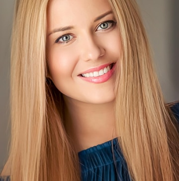 Beauty femininity beautiful blonde woman with long blond hair smiling natural portrait 360074 