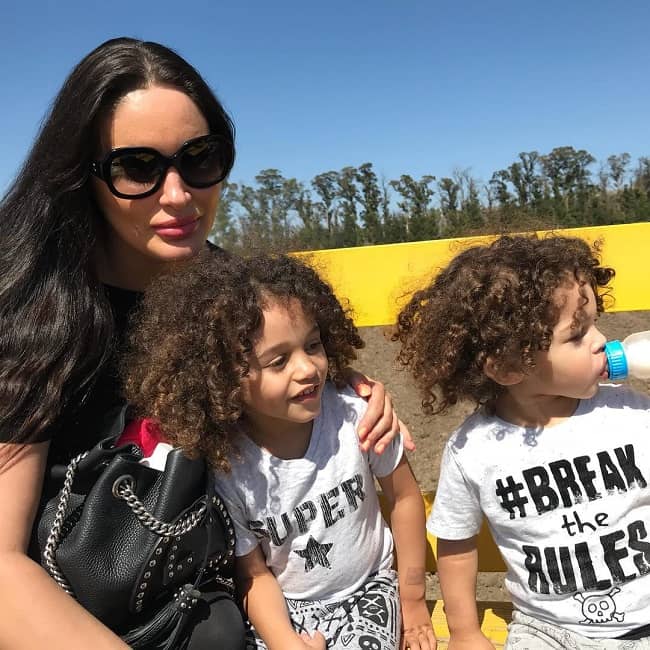 Korina Longin posing for a photo with her sons