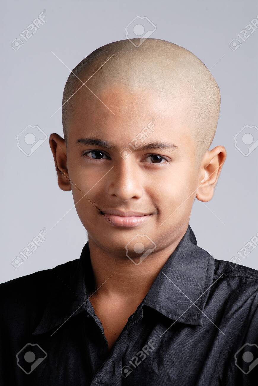 86335347 portrait of south asian indian bald boy