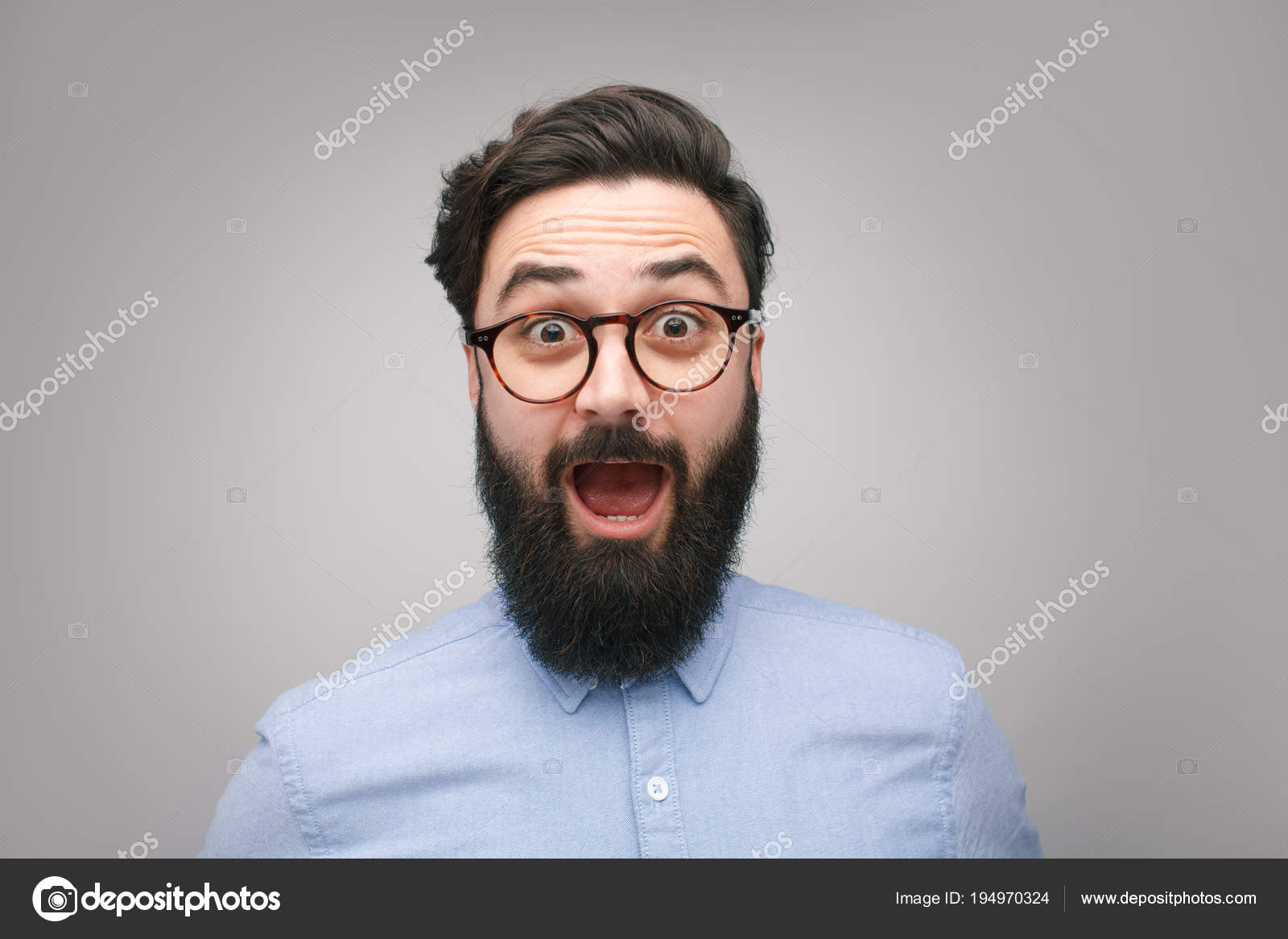 3516584 depositphotos 194970324 stock photo shocked bearded man in glasses