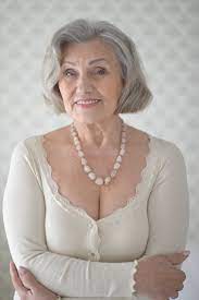 Premium Photo | Portrait of a happy senior woman close up