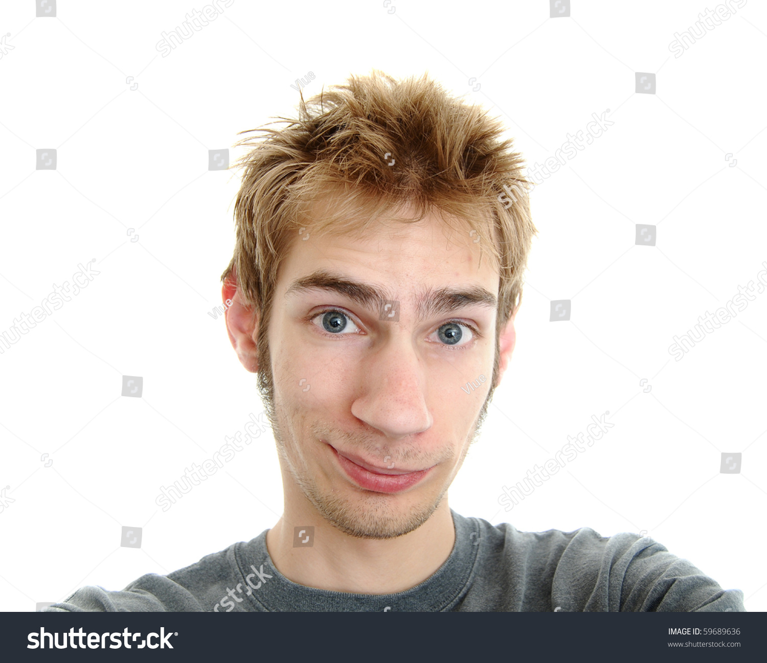 Stock photo a generic white cauasian young adult male smiling with a pleasant look on his face
