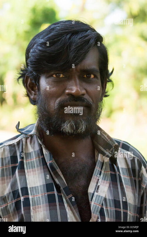 Stern looking tamil man ECNPJP