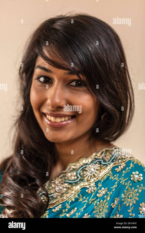 headshot-portrait-of-a-beautiful-indian-woman-smiling-DK14HY.jpg