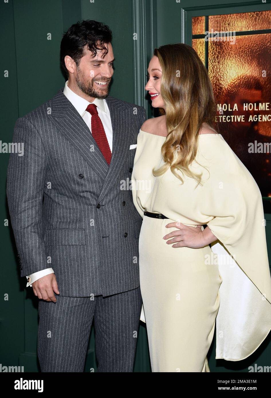 Actor henry cavill left and girlfriend natalie viscuso attend the world premiere of enola holm