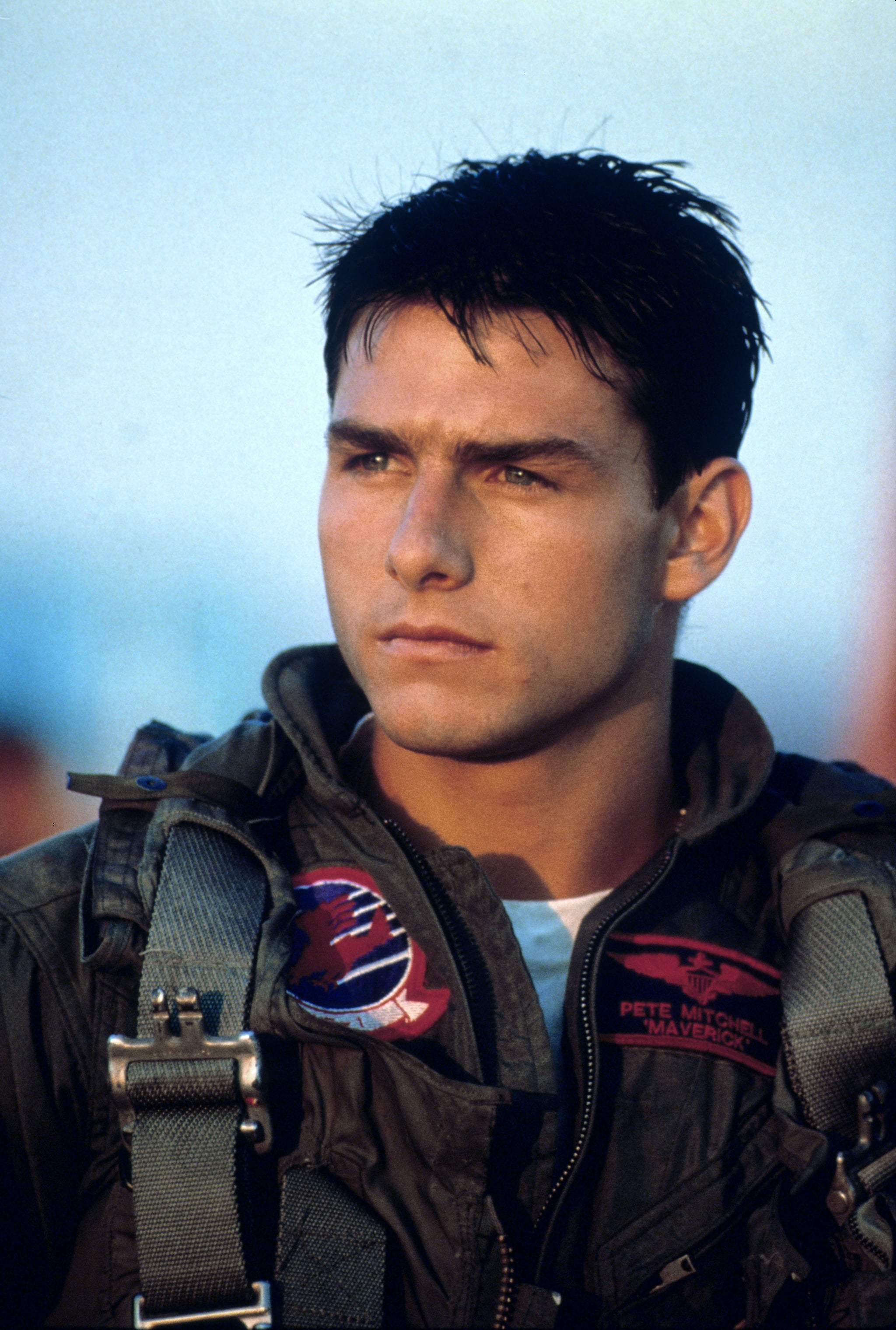 Tom Cruise as Pete Maverick Mitchell Then