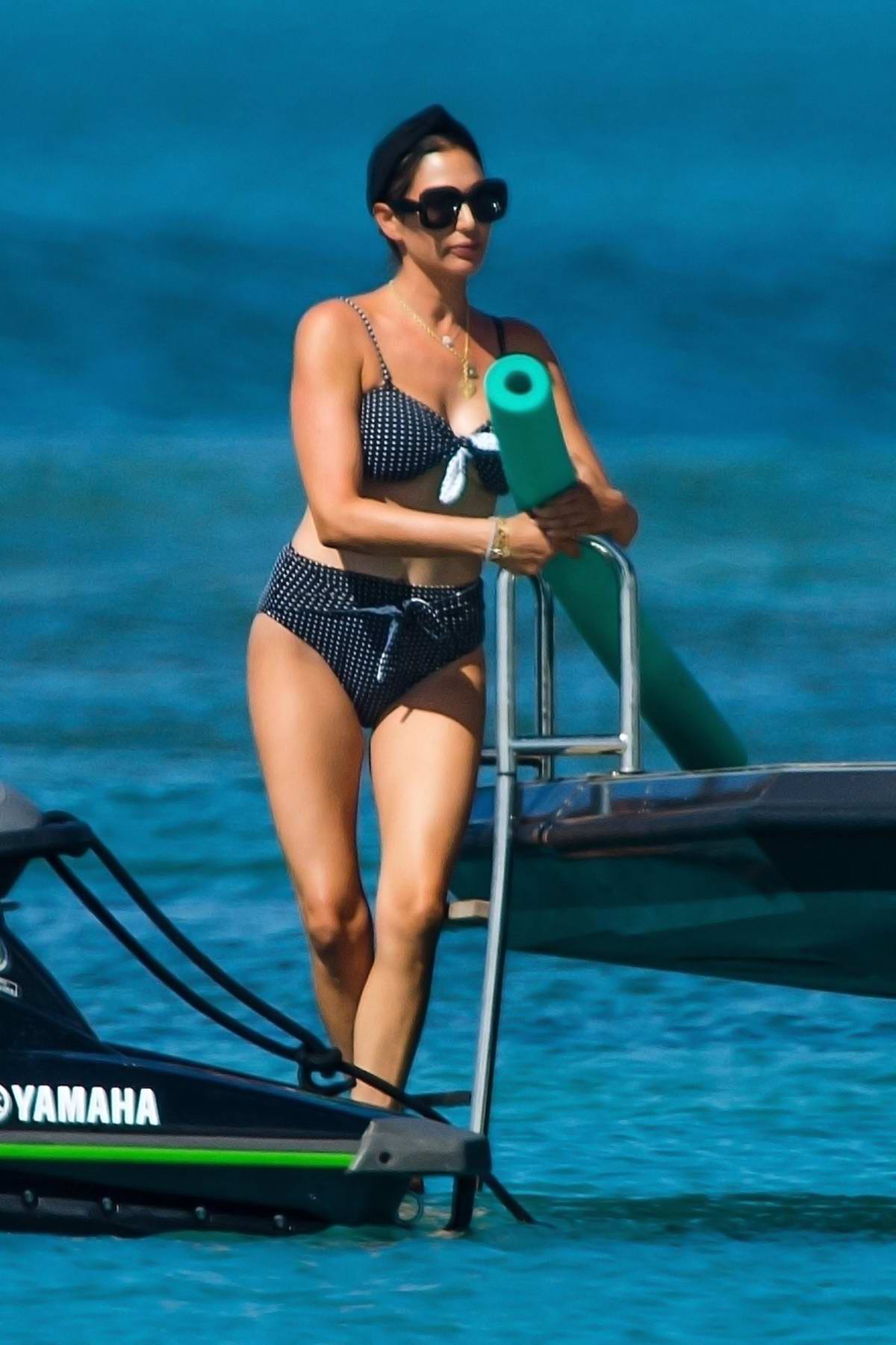 Lauren silverman shows off her toned body in a printed bikini while relaxing on a boat in brid