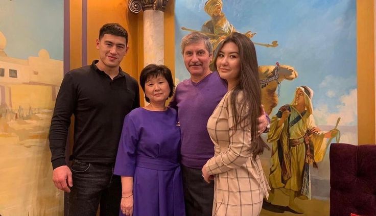 The family of Russian boxer Dmitry Bivol   pictured here with his parents and 