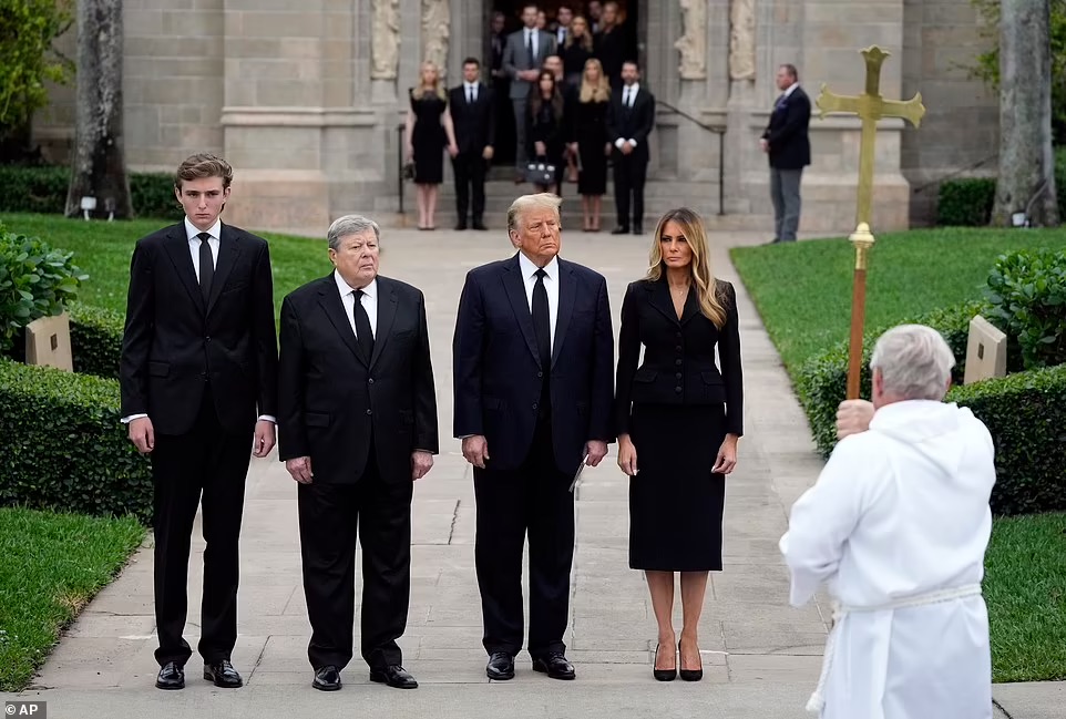 80191557 12980173 They walked slowly towards the church as a foursome in complete  a 72 17056