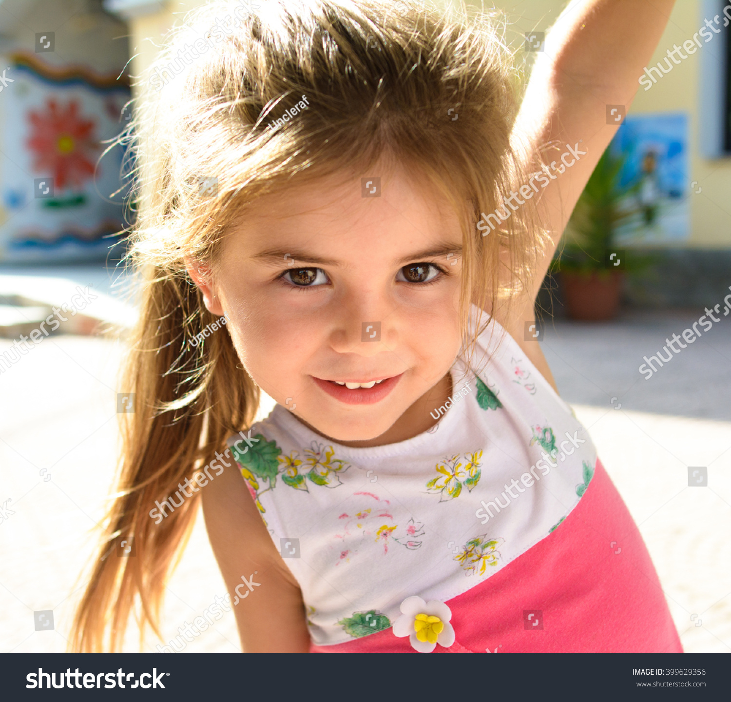 Stock photo cute and young little girl smiling 399629356