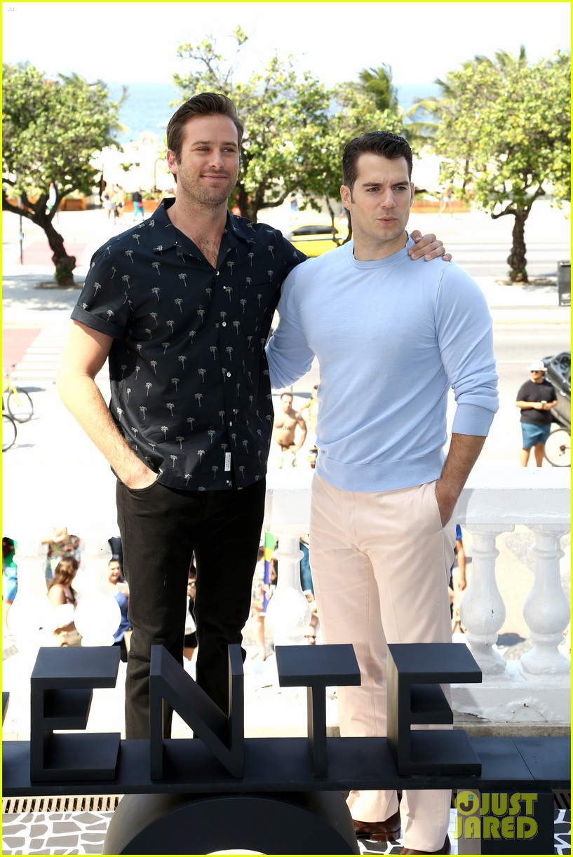 Henry cavill armie hammer pose by the beach in rio 24