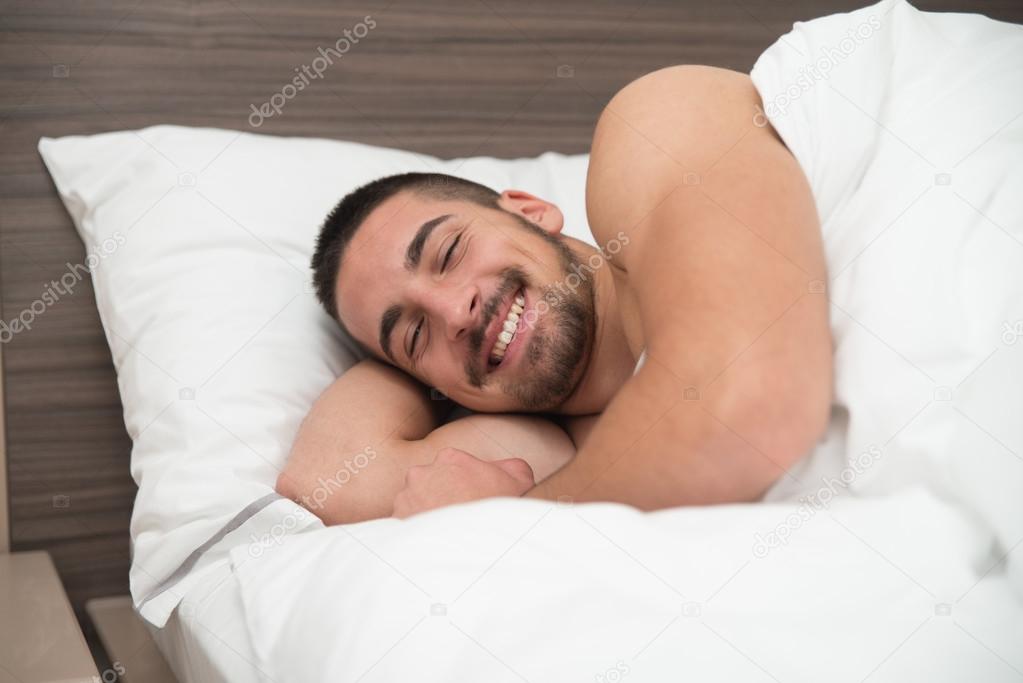 Depositphotos 60882533 stock photo happy man waking up in