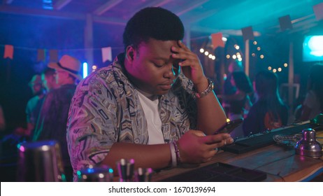 Tired lonely afroamerican guy checking 260nw 1670139694