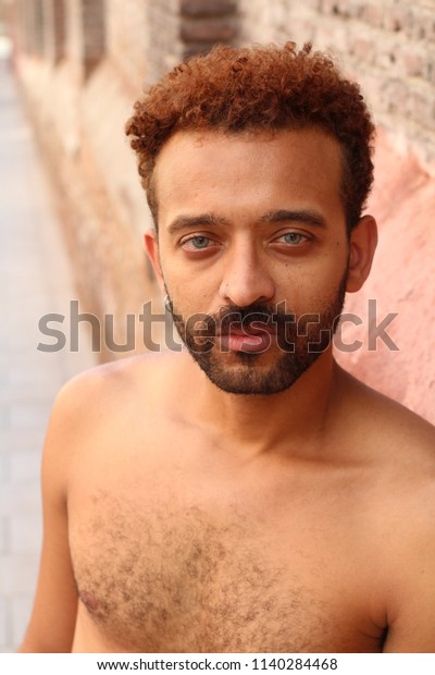 Gorgeous mixed race man blue 600w 1140284468
