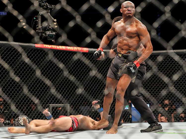 Kamaru Usman of Nigeria celebrates his victory over Jorge Masvidal of the United States during