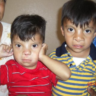 Two male 3 and 5 years old patients from the same family brothers had different Q320
