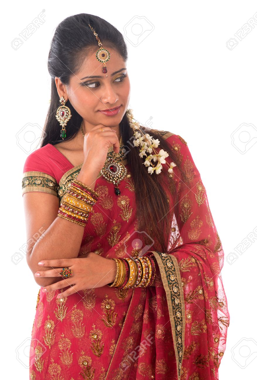 21621328 portrait of beautiful young indian woman in traditional sari dress thinking standing 