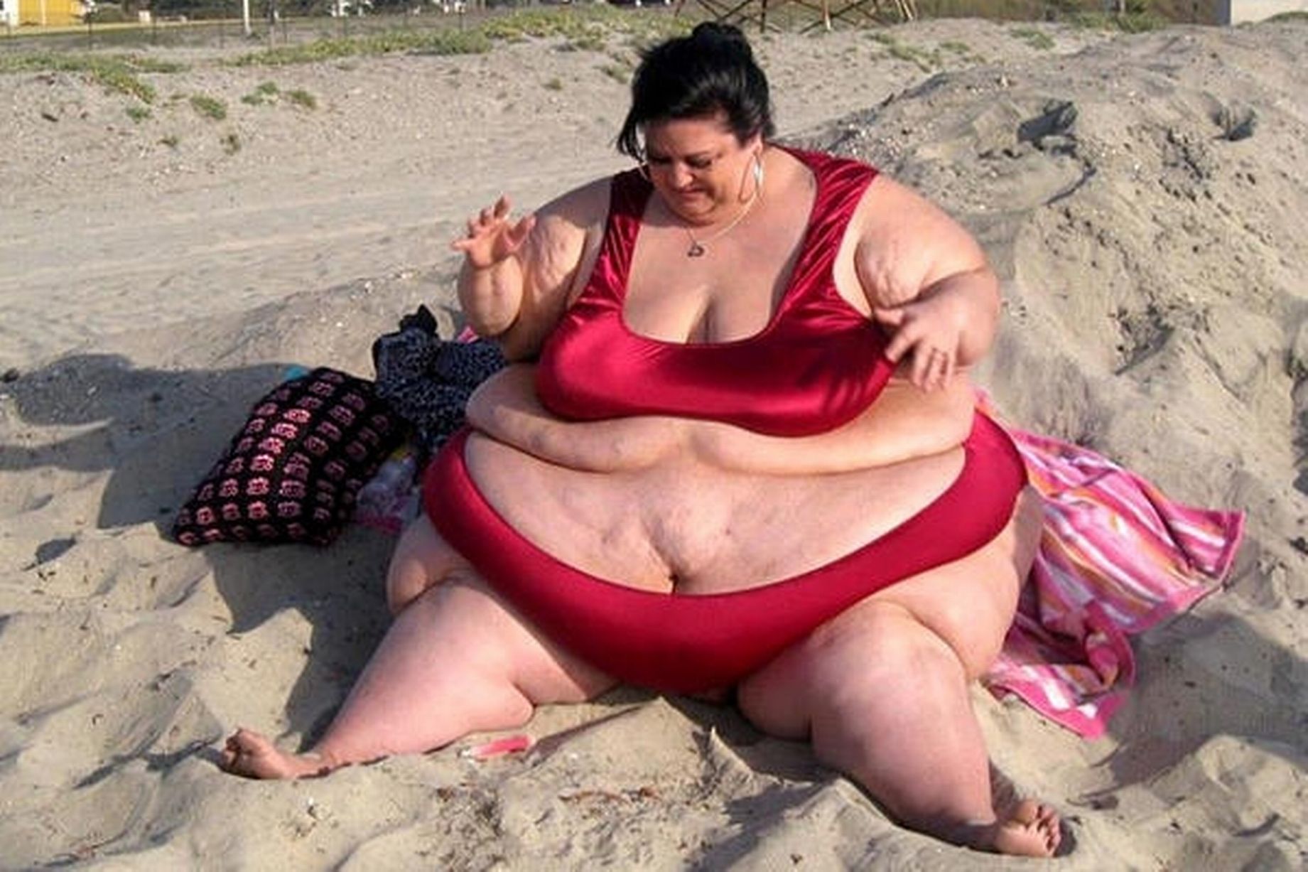 Patty relaxing on the beach at her heaviest weight of 52 stone