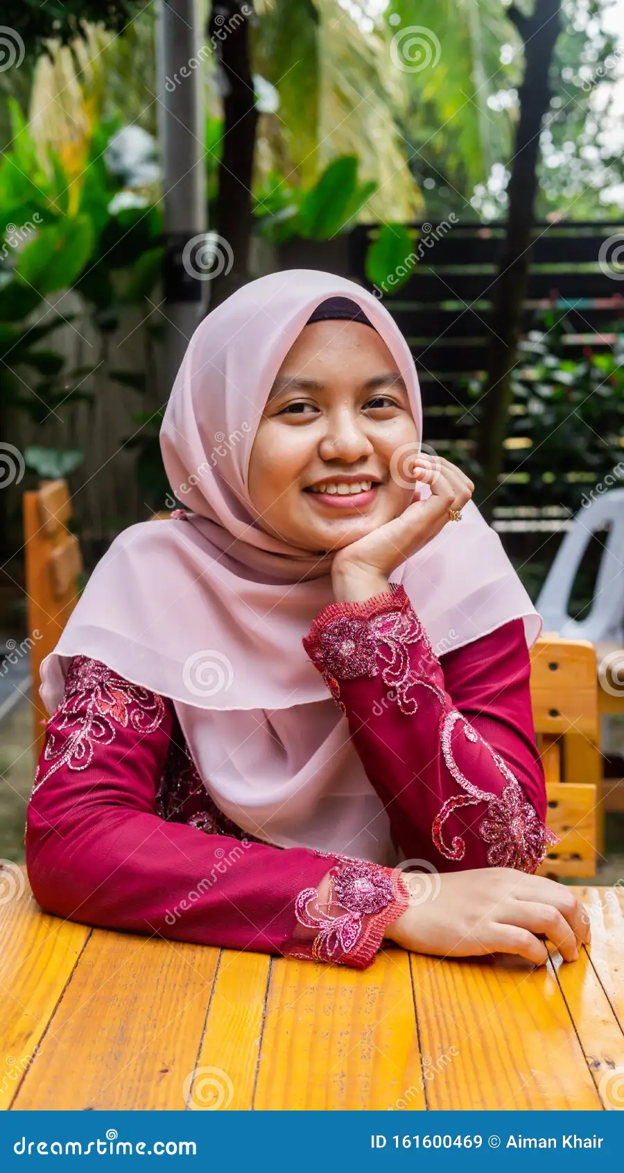 Portrait beautiful young muslim malay woman wearing hijab modern traditional dress called por