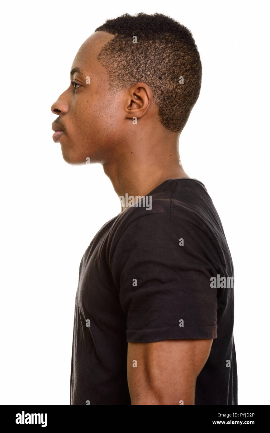 Profile view of young african man isolated against white background PYJD2P