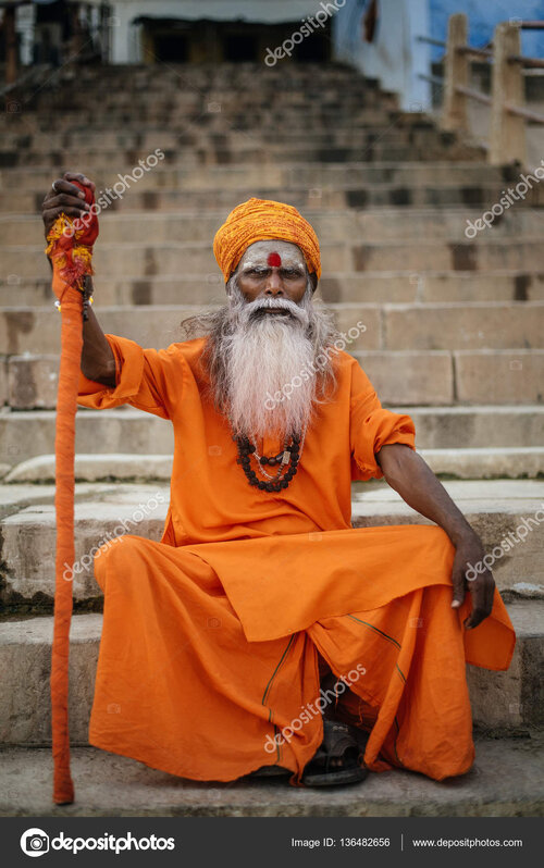 Depositphotos 136482656 stock photo indian monk sitting on stairs