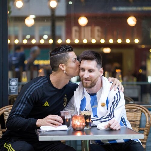 Ronaldo kissing messi