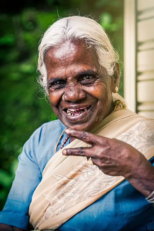 Happy old indian woman elderly wrinkles smiling black wrinkled face white hair worn teeth wea