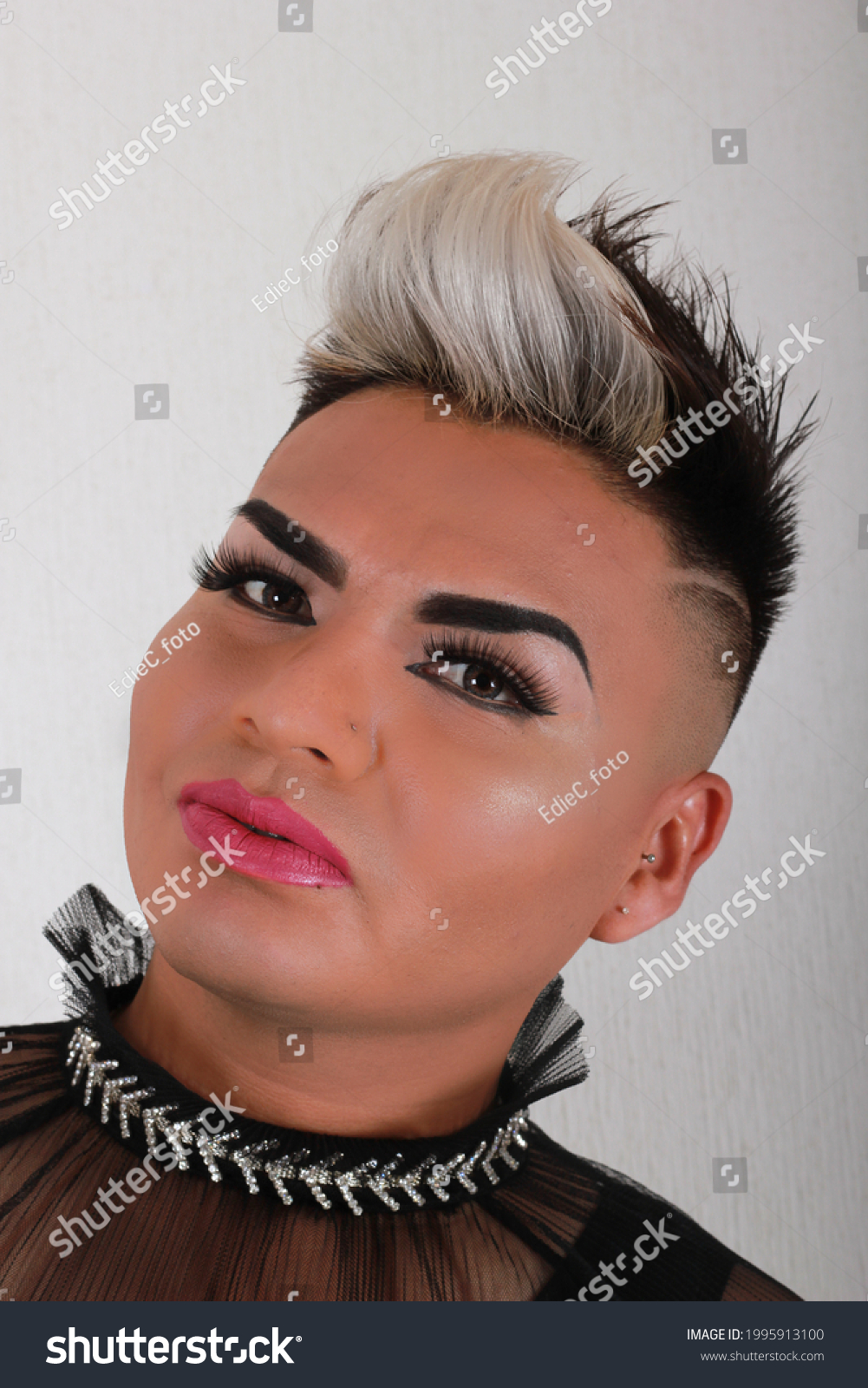 Stock photo gay model wearing makeup white background 1995913100