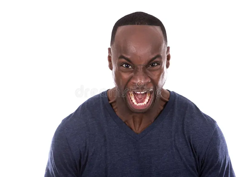 Angry black man young casual wearing blue tshirt white background 66273071