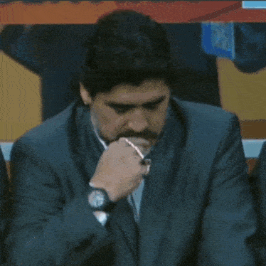 Maradona praying