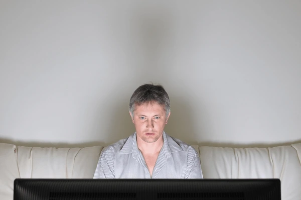 Man alone staring television computer 600nw 61638415 Man alone staring television computer 600nw 61638415