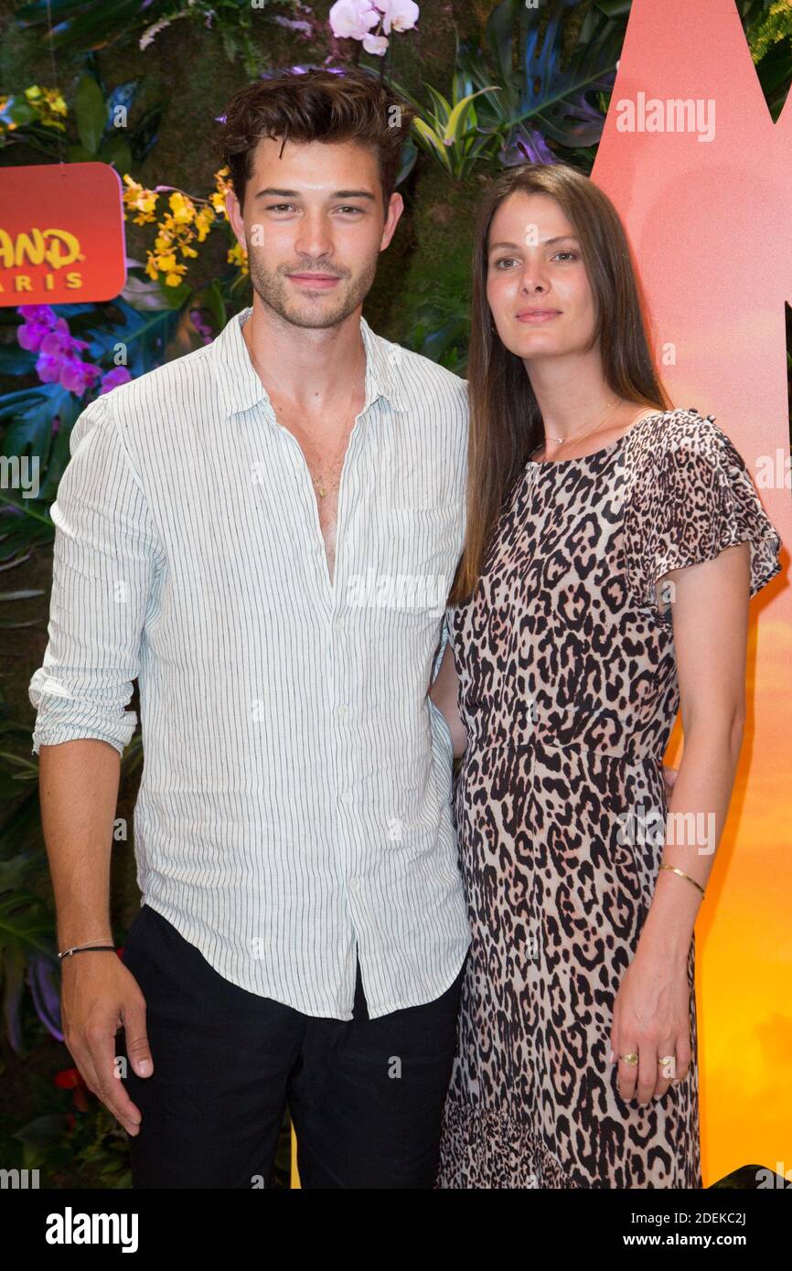 Francisco lachowski his wife jessiann gravel beland and their childrens attends the lion king 