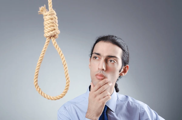 Businessman committing suicide through hanging 600nw 90157864