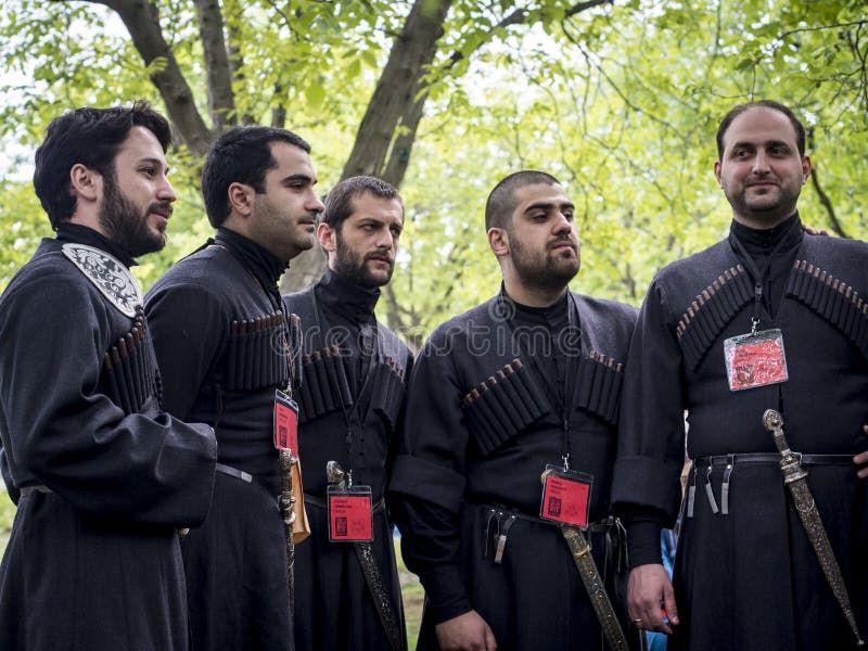 Young wine festival tbilisi georgian men dresses national clothes annual ethnographic museum m
