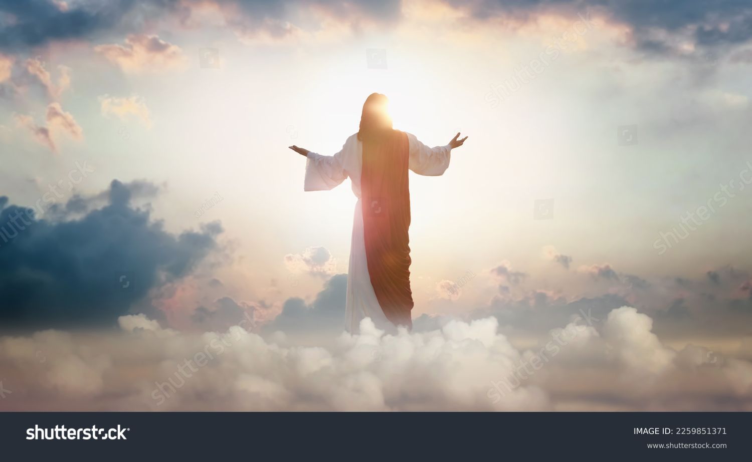 Stock photo the resurrected jesus christ ascending to heaven above the bright light sky and cl