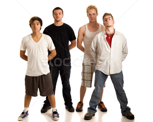 1234554 stock photo small group of young men studio shot over white